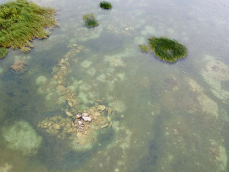 Old flooded sand pit aerial photoの写真素材