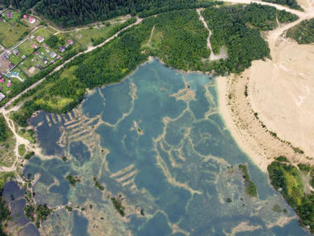 Old flooded sand pit aerial photoの写真素材