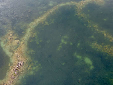 Old flooded sand pit aerial photoの写真素材