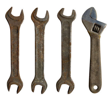 set of old wrenches on a white isolated backgroundの写真素材