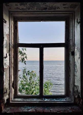 view from the window of the house against the background of the sea