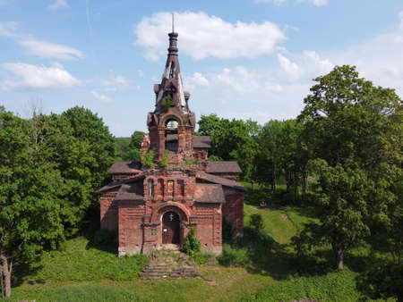 an old building with grass and trees,aerial photoの写真素材