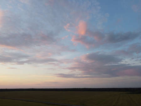 sunset sky with clouds backgroundの写真素材
