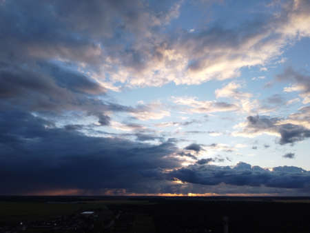sunset sky with clouds backgroundの写真素材