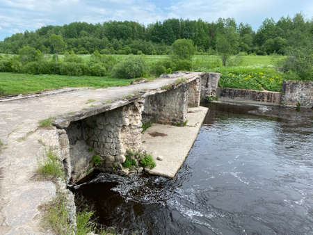 Abandoned hydroelectric power station in Russia on a summer dayの写真素材