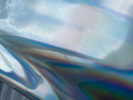 holographic rainbow foil abstract backgroundの写真素材