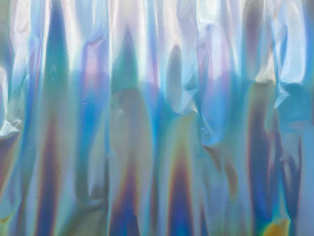 holographic rainbow foil abstract backgroundの写真素材