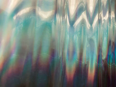 holographic rainbow foil abstract backgroundの写真素材
