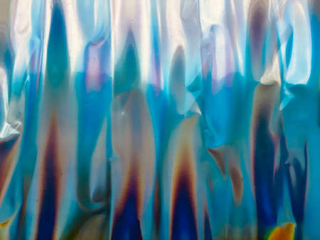 holographic rainbow foil abstract backgroundの写真素材