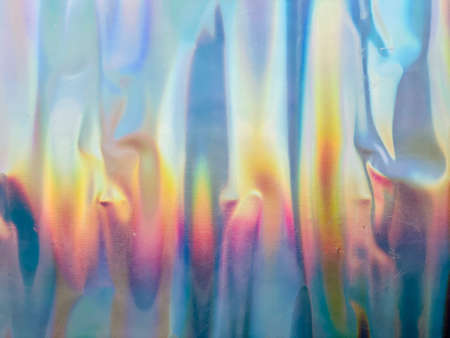 holographic rainbow foil abstract backgroundの写真素材