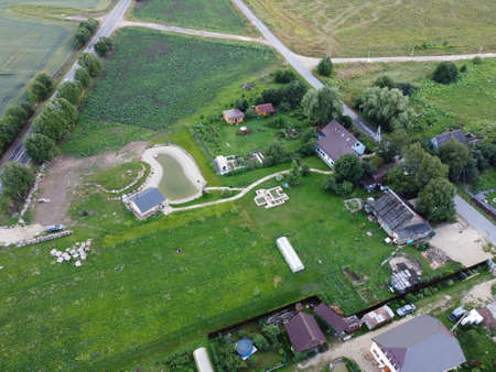small village aerial photography on a summer sunny dayの写真素材