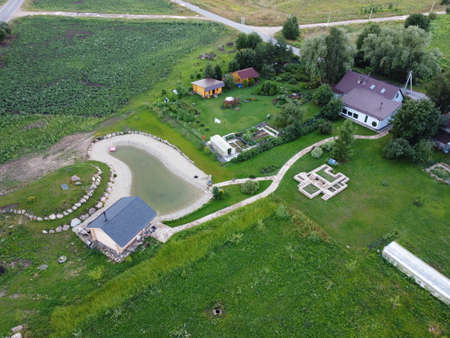 small village aerial photography on a summer sunny dayの写真素材