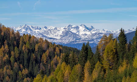 Val Gardena, Italy - October 27, 2014: Wonderful autumn view at Alps and a colorful forest.の写真素材