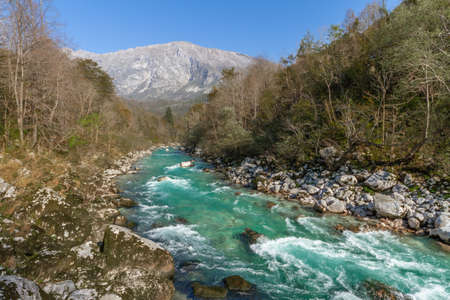 Kobarid, Slovenia - October 28, 2014: The Soca river flows through western Slovenia and its source lies in the Julian Alps. One of the most beautiful rivers in Europa, known for its emerald color.の写真素材