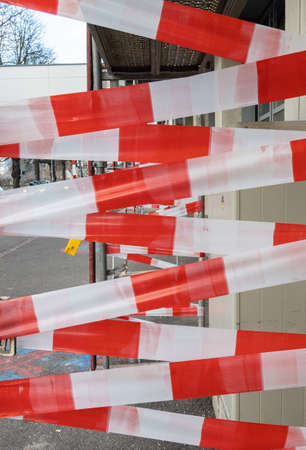 Zurich, Switzerland - January 10, 2021: Warning red and white stripes on the construction siteのeditorial素材