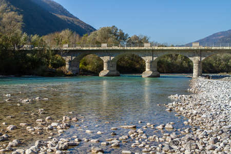 Kobarid, Slovenia - October 28, 2014: The Soca river flows through western Slovenia and its source lies in the Julian Alps. One of the most beautiful rivers in Europa, known for its emerald color.のeditorial素材