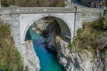 Kobarid, Slovenia - October 28, 2014: The Soca river flows through western Slovenia and its source lies in the Julian Alps. One of the most beautiful rivers in Europa, known for its emerald color.のeditorial素材