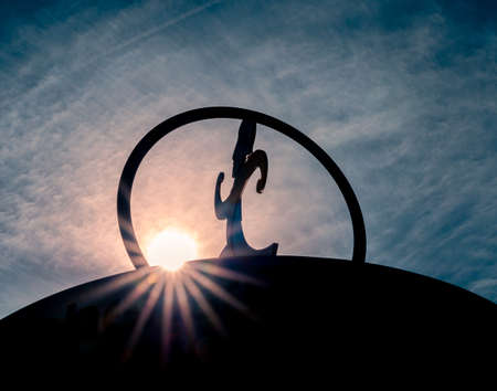 Figure of a runner and a sun star - traditional lake run around Lake Reschen in South Tyrolの写真素材