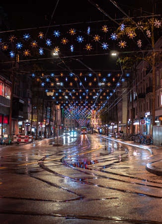 Zurich, Switzerland - November 30, 2021: Illuminated Lowenstrasse street in Zurich and its Christmas decorationのeditorial素材