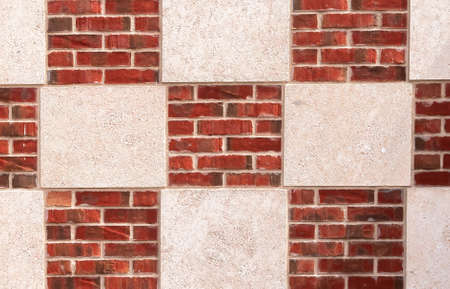 Background image with square brick figures in the wallの写真素材
