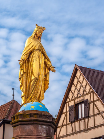 Obermorschwihr, France - October 11, 2022: Medieval statue of holy Mary in the center of the old town of Obermorschwihr in Alsace, Franceのeditorial素材