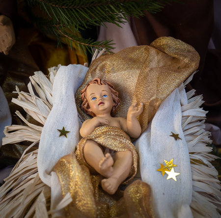 Sutrio, Italy - December 29, 2022: Newborn Jesus in the Christmas nativity sceneのeditorial素材