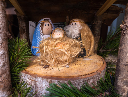 Sutrio, Italy - December 29, 2022: Hand-made figurines of the holy family - Christmas nativity sceneのeditorial素材