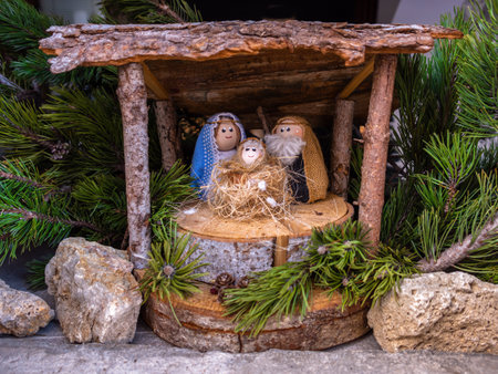 Sutrio, Italy - December 29, 2022: Hand-made figurines of the holy family - Christmas nativity sceneのeditorial素材