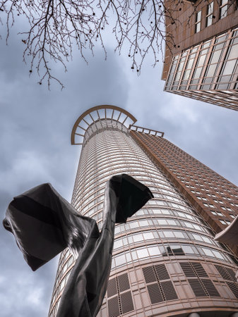 Frankfurt, Germany - January 29, 2023: The Westend Tower (DZ Bank) in Frankfurt with its sculpture Inverted Collar and Tieのeditorial素材