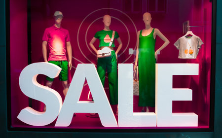 Villach, Austria - July 12, 2023: Big Sale sign on the display window of a fashion store