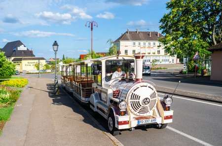 Ribeauville, France - July 5, 2023: Tourist train offers a way to discover Ribeauville and vineyards of Hunawihr in Alsaceのeditorial素材