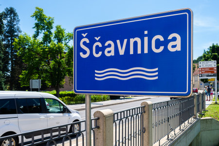 Ljutomer, Slovenia - July 14, 2023: Sign, indicating river Scavnica, flowing through Ljutomer, Sloveniaのeditorial素材