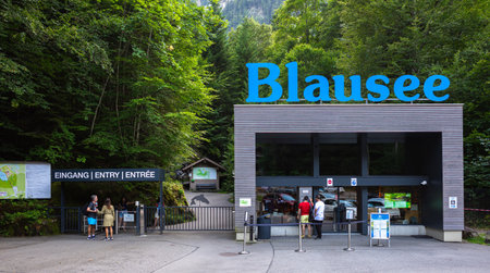 Blausee, Switzerland - August 23, 2023: Entry to the scenic mountain lake Blausee, located in the Kander valley above Kandergrund in the Jungfrau region, Switzerland.のeditorial素材
