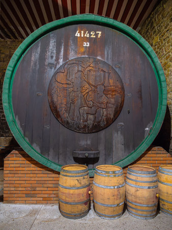 Koper, Slovenia - November 8, 2023: Bigest wine barrel in wine cellar of Vinakoper, an independent company with approximately 430 ha of its own vineyards in the Koper regionのeditorial素材