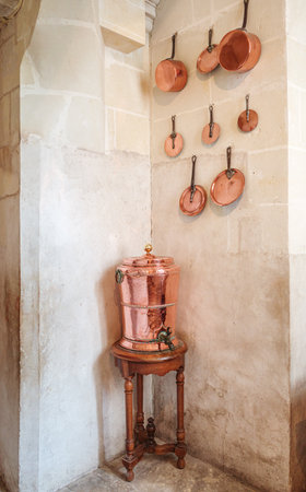 Chambord, France - August 8, 2023: Antique copper dishes in the kitchen of Chenonceaux Castleのeditorial素材