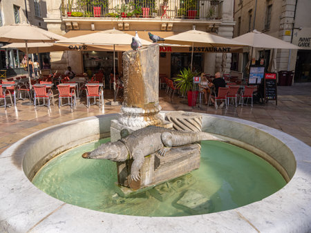 Nimes, France - October 4, 2023: Fountain of the crocodile -Fontaine du Crocodile - in Nimesのeditorial素材