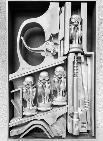 Gruyeres, Switzerland - January 6, 2024: Surrealist statue of alien machine man, creation of artist Gigerのeditorial素材