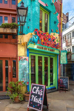 London, United Kingdom - April 29, 2024: Neal's Yard is home to a collection of independent restaurants, cafes, shops and wellbeing brands. Hair by Fairy haircut studioのeditorial素材