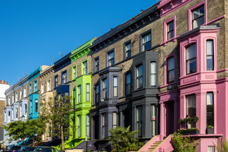 London, United Kingdom - April 29, 2024: A row of colorful houses in Notting Hillのeditorial素材