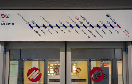 Lausanne, Switzerland - September 24, 2025: Metro station entrance of Lausanne Ouchy-Olympique with line map and directional signs.のeditorial素材