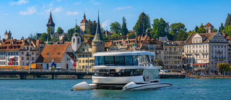 Luzern, Switzerland - August 25, 2025: Burgenstock Catamaran is a modern passenger ferry on Lake...