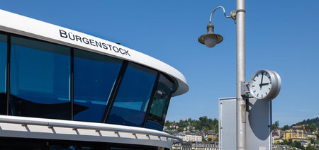 Lucerne, Switzerland - August 25, 2025: Burgenstock Catamaran is a modern passenger ferry on Lake...