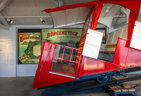 Burgenstock, Switzerland - July 7, 2025: A historical red cable car vehicle of Burgenstockbahn -...