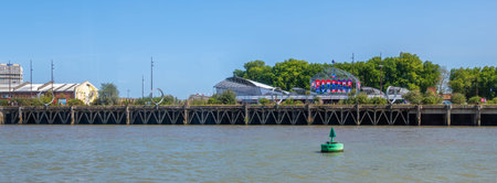 Nantes, France - August 5, 2025: Panoramic view of a riverside Ile de Nantes district, transformed...