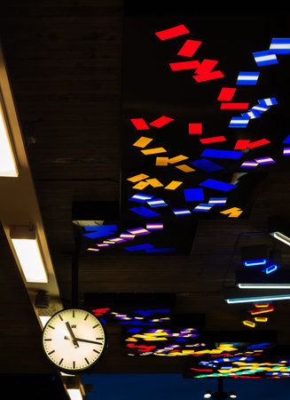 Stockholm, Sweden - June 3, 2025: A modern clock at the train station displaying the time,...