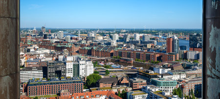 Hamburg, Germany - June 30, 2025: Aerial view of a cityscape of Hamburg, modern buildings, parks,...