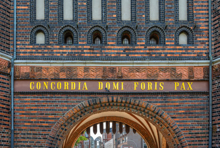 Latin Inscription on the Holsten Gate- Holstentor. English translation: Harmony at home, peace abroad.のeditorial素材