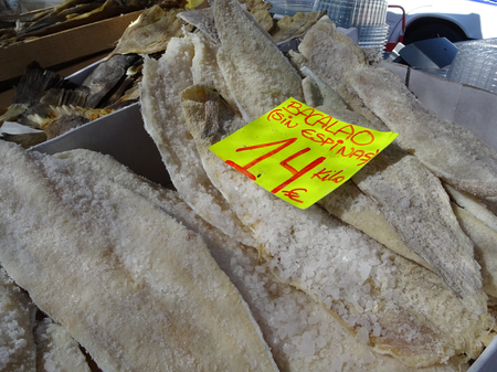 dried cod fish at the market stall for Easter with price tagの写真素材