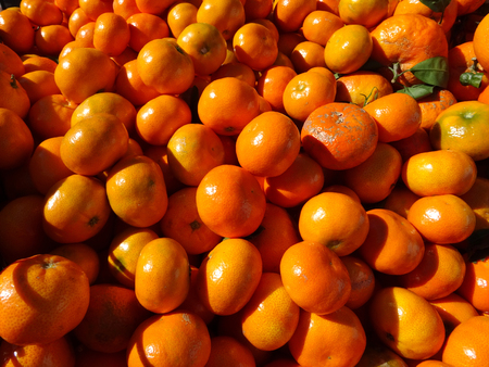 close-up of tangerines at a market stallの写真素材