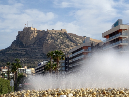 View of the Santa Barbara Castle of Alicante from the harborの写真素材